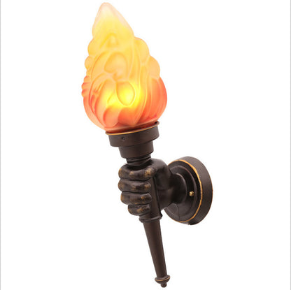Vägglampa i fackelstil