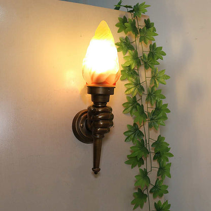Vägglampa i fackelstil
